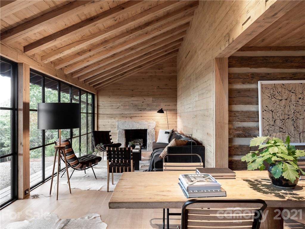 318 Summer Haven Lane Saluda, NC 28773 - Photo 8 of 40 a living room with furniture a flat screen tv and a table