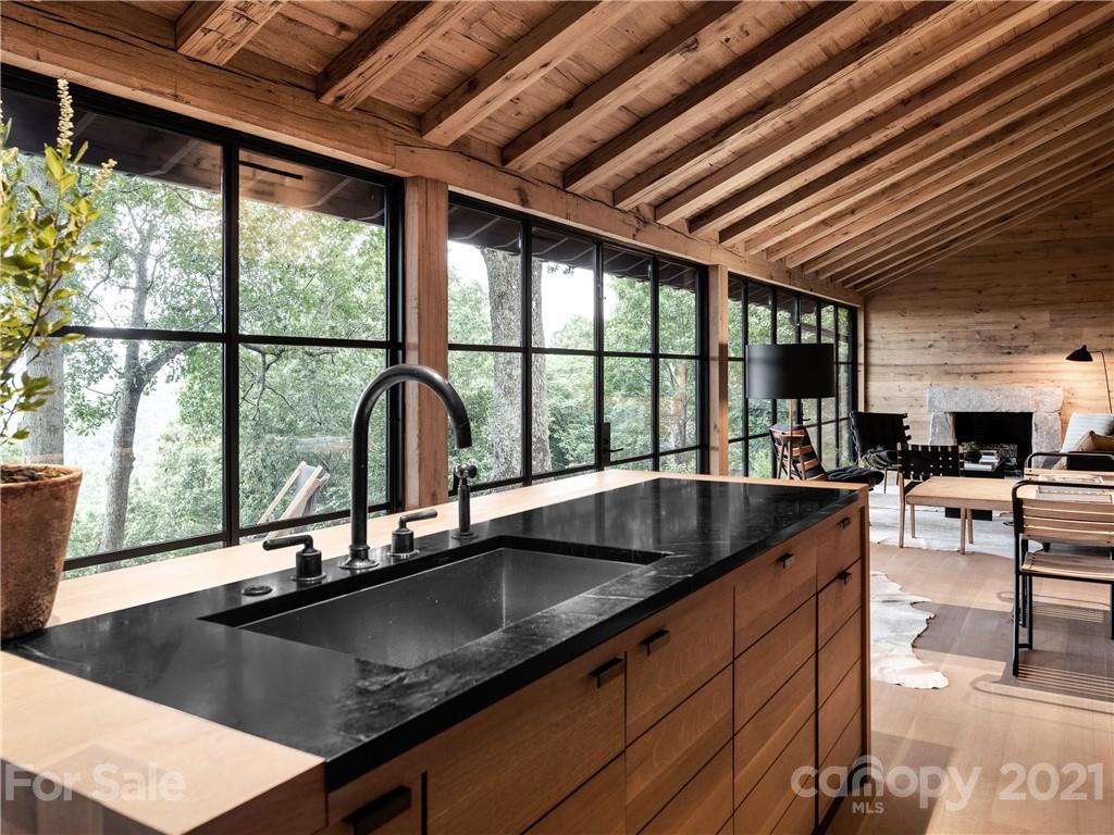 318 Summer Haven Lane Saluda, NC 28773 - Photo 10 of 40 a kitchen with a sink and large window