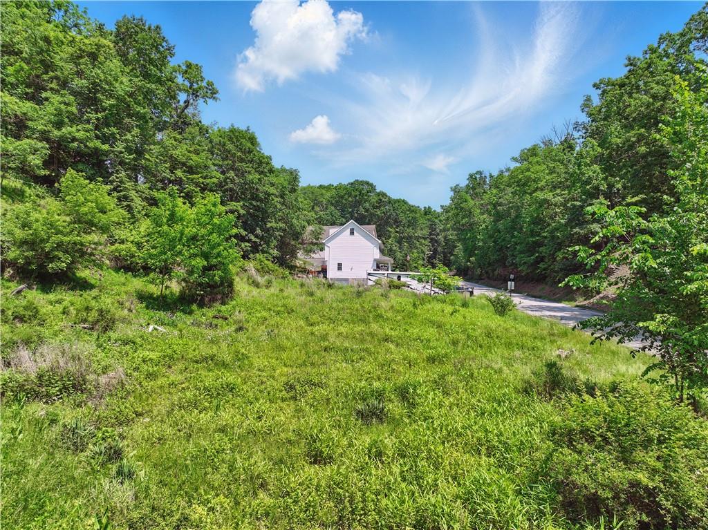 3356 Tarr Hollow Road Murrysville, PA 15668 - Photo 5 of 23 a aerial view of a house with yard and outdoor seating