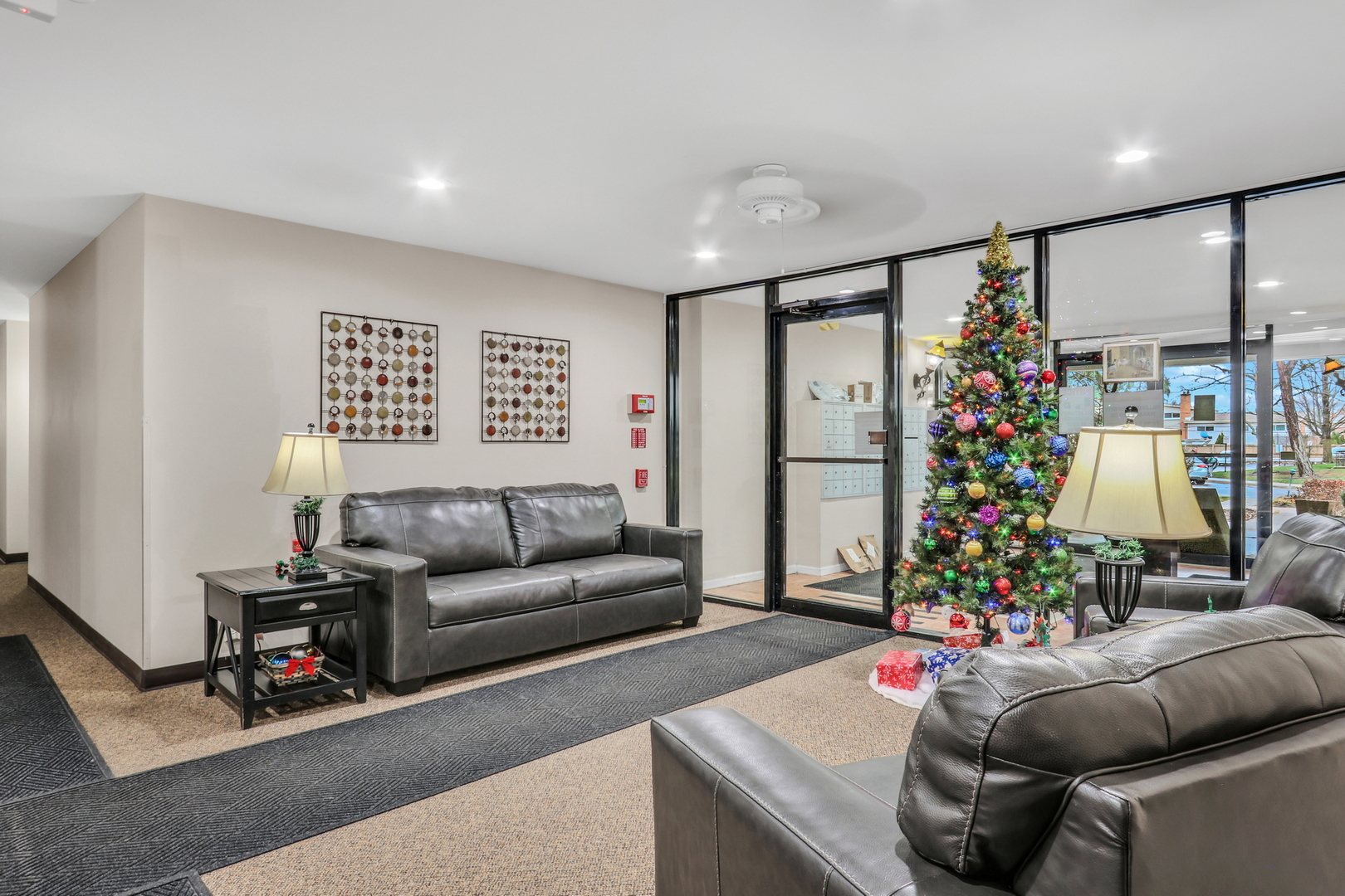 8620 Waukegan Road, Unit 107 Morton Grove, IL 60053 - Photo 2 of 18 a living room with furniture and flowers