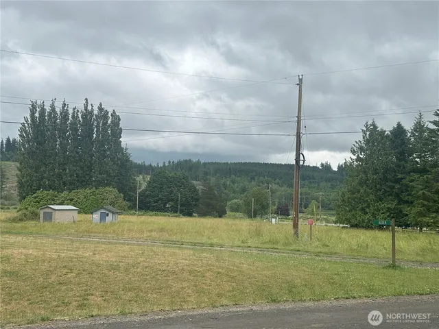 a lake view with a play ground in the back