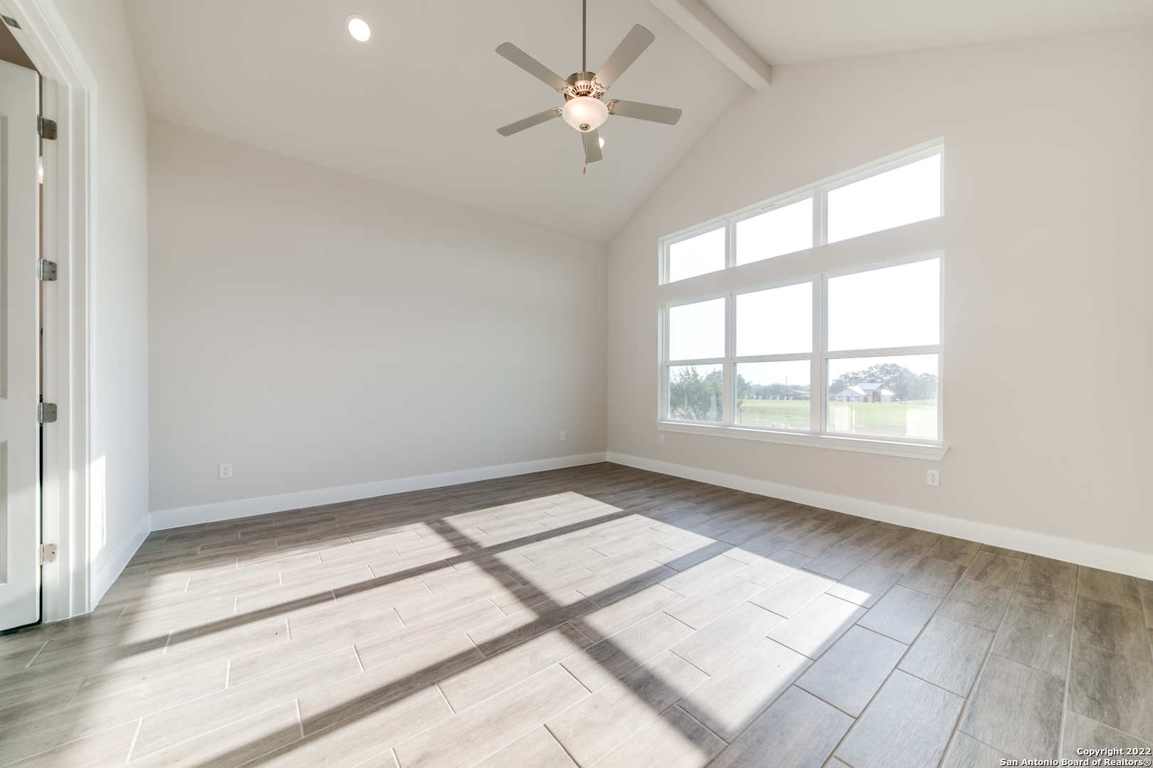 238 Peter Kleid Loop Blanco, TX 78606 - Photo 15 of 25 a view of an empty room with a window