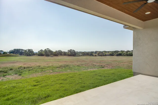 a view of a lake from a yard