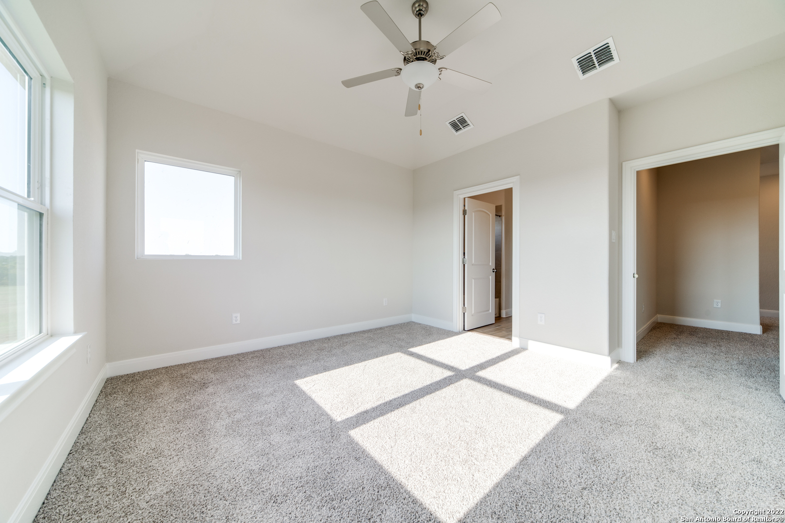 238 Peter Kleid Loop Blanco, TX 78606 - Photo 23 of 25 a view of an empty room with a window