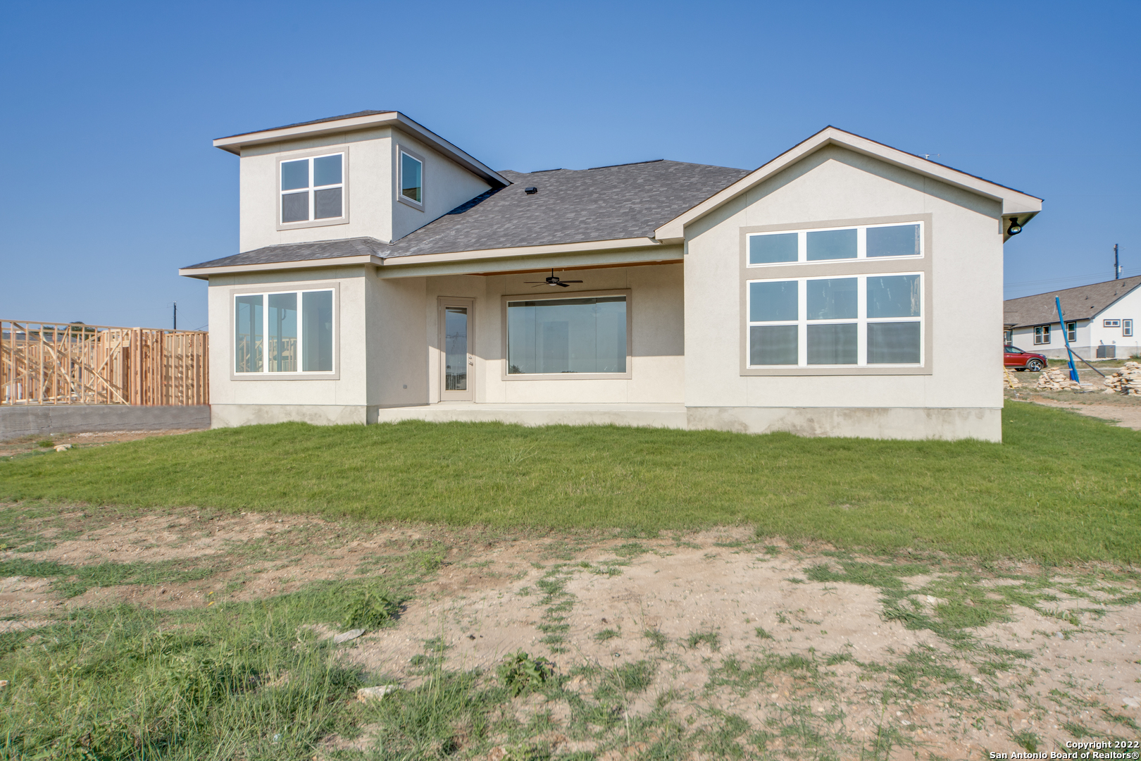 238 Peter Kleid Loop Blanco, TX 78606 - Photo 25 of 25 a front view of a house with a garden