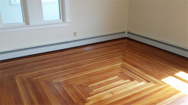 81 Winter Street Bellingham, MA 02019 - Photo 11 of 20 a view of a room with wooden floor and staircase