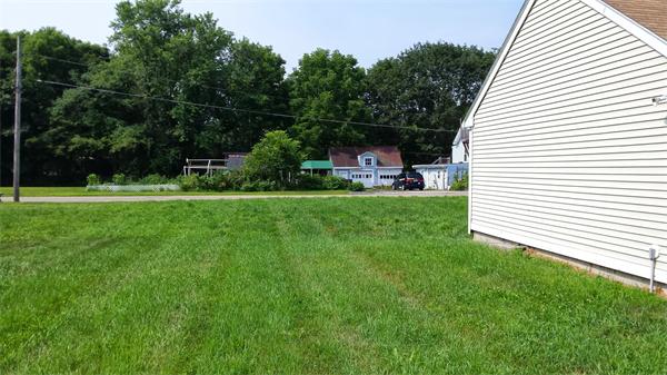 81 Winter Street Bellingham, MA 02019 - Photo 5 of 20 a view of a backyard with sitting area