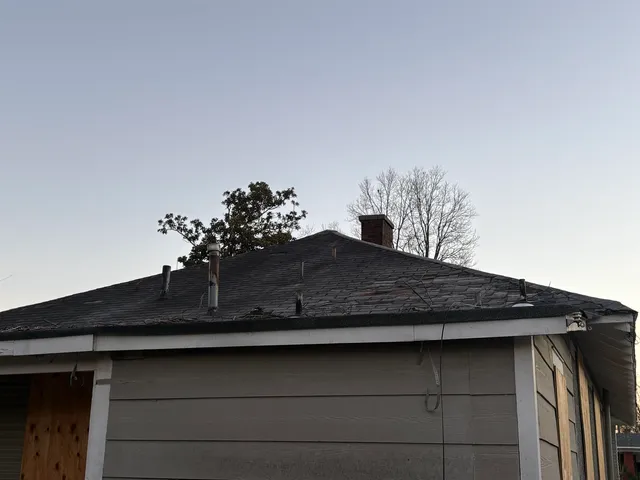 a black and white photo of a white building