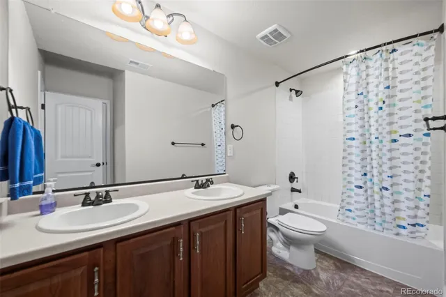 a view of a patio with a table chairs and a backyard