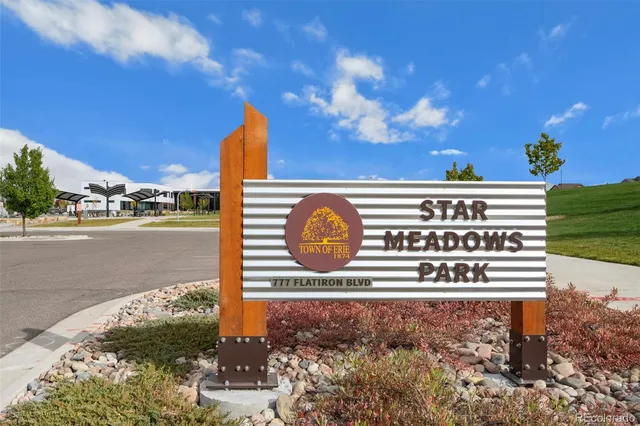 a view of a swimming pool and an outdoor space