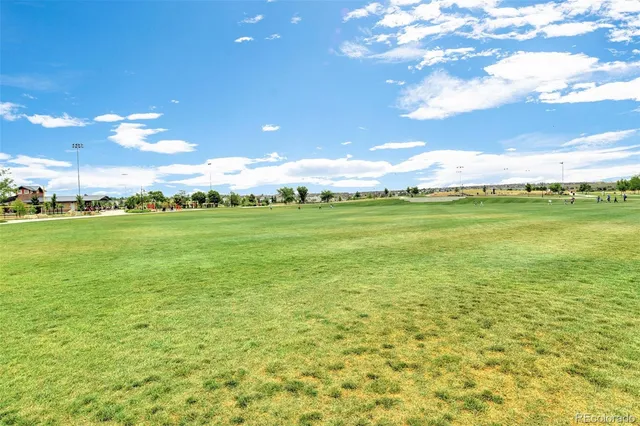 an aerial view of a houses with ocean view