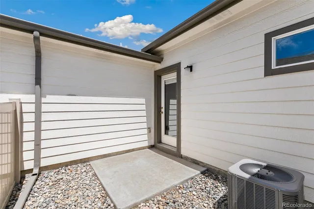 a view of a door and a window
