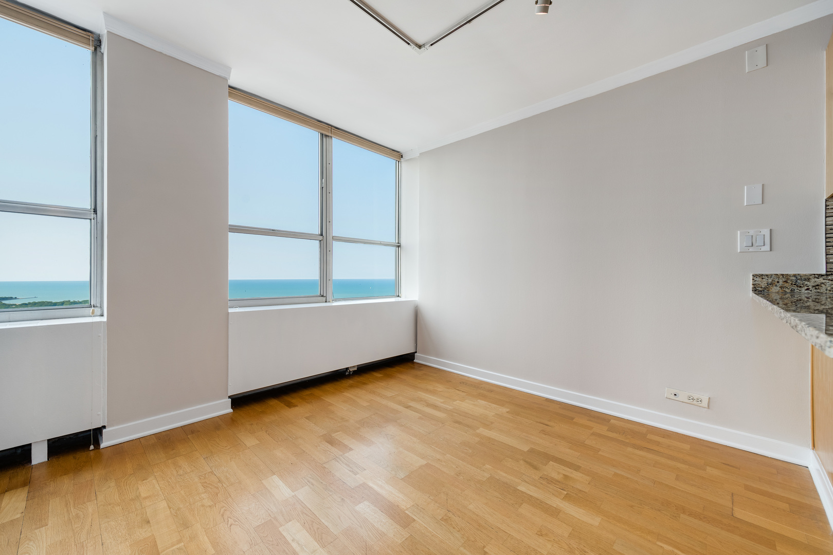 655 West Irving Park Road, Unit 5106 Chicago, IL 60613 - Photo 11 of 30 a view of an empty room with a window