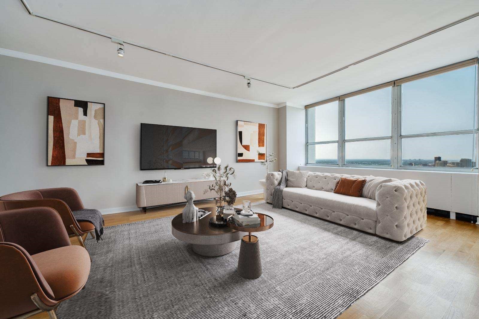 655 West Irving Park Road, Unit 5106 Chicago, IL 60613 - Photo 14 of 30 a living room with furniture a flat screen tv and a large window