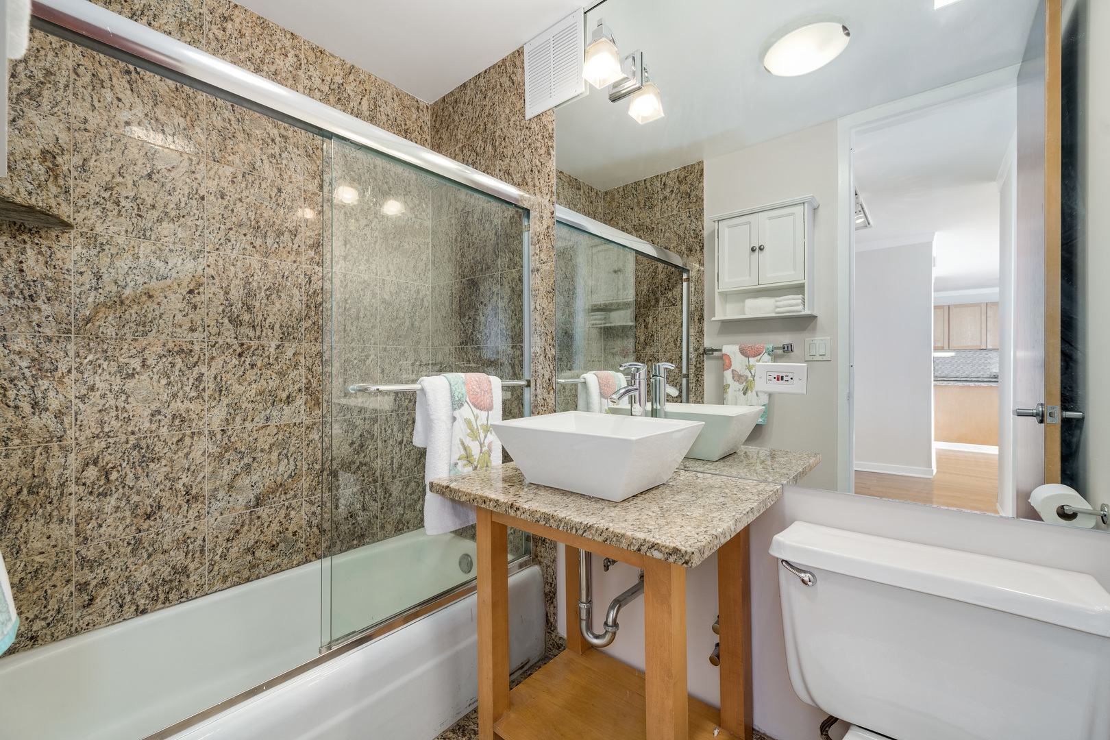 655 West Irving Park Road, Unit 5106 Chicago, IL 60613 - Photo 16 of 30 a bathroom with a sink and a bathtub