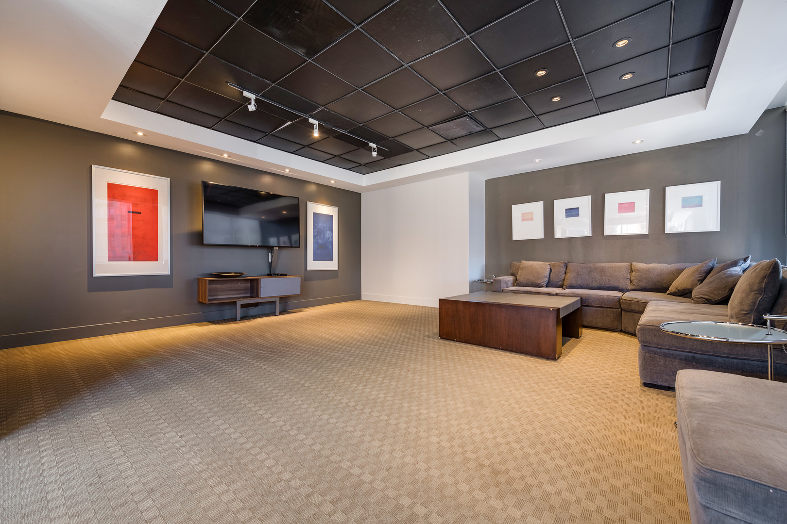 655 West Irving Park Road, Unit 5106 Chicago, IL 60613 - Photo 29 of 30 a living room with furniture and a flat screen tv