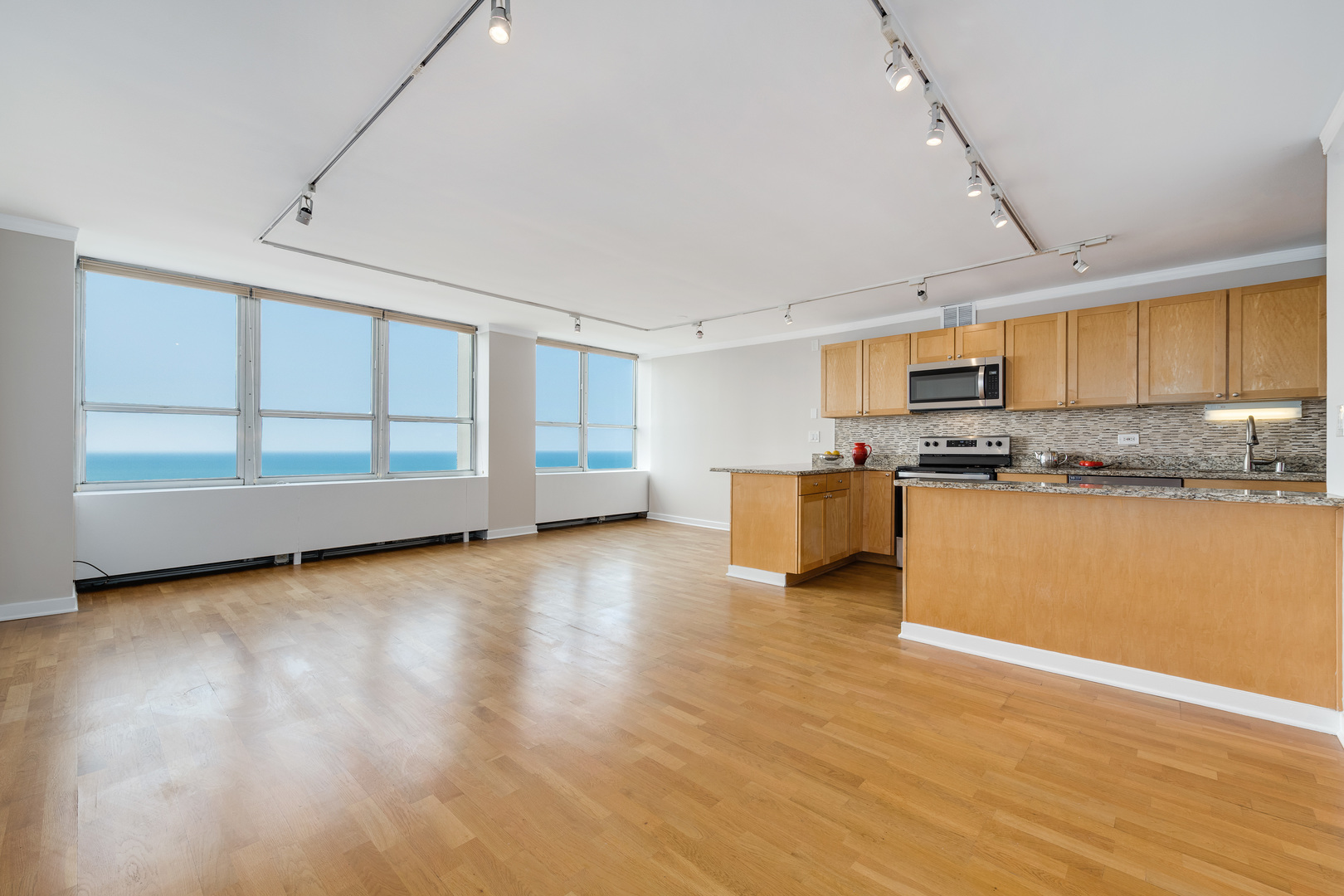 655 West Irving Park Road, Unit 5106 Chicago, IL 60613 - Photo 6 of 30 a view of kitchen with microwave and cabinets