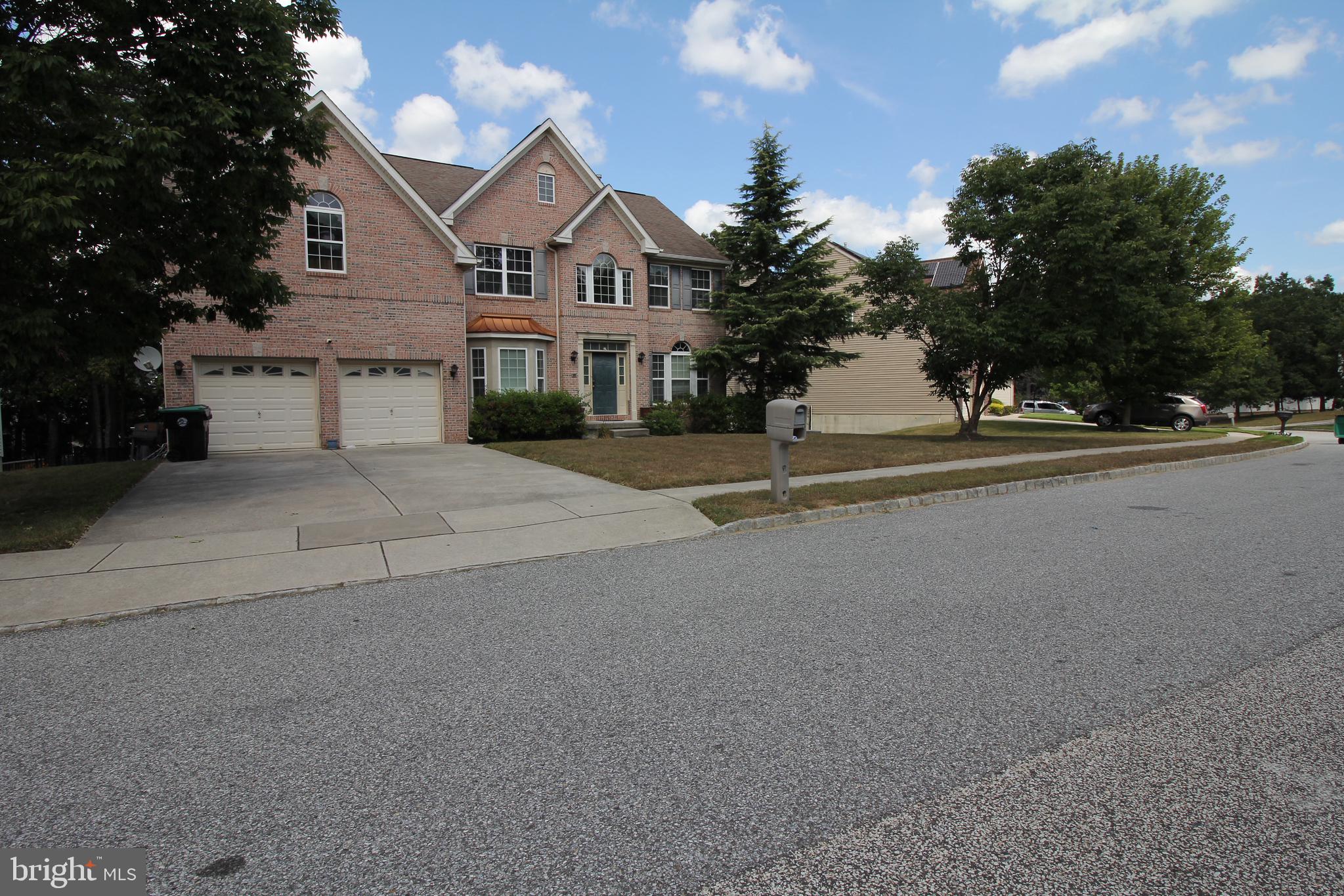 5 Kelly Drive Sicklerville, NJ 08081 - Photo 1 of 32 front view of house with a street