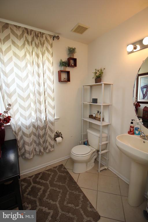 5 Kelly Drive Sicklerville, NJ 08081 - Photo 14 of 32 a bathroom with a toilet sink and shower