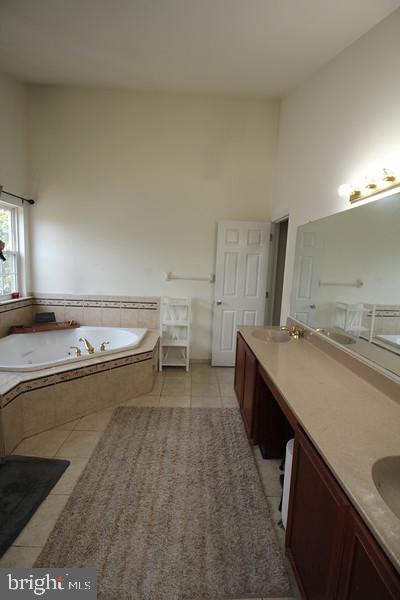5 Kelly Drive Sicklerville, NJ 08081 - Photo 25 of 32 a kitchen with a sink and a stove top oven