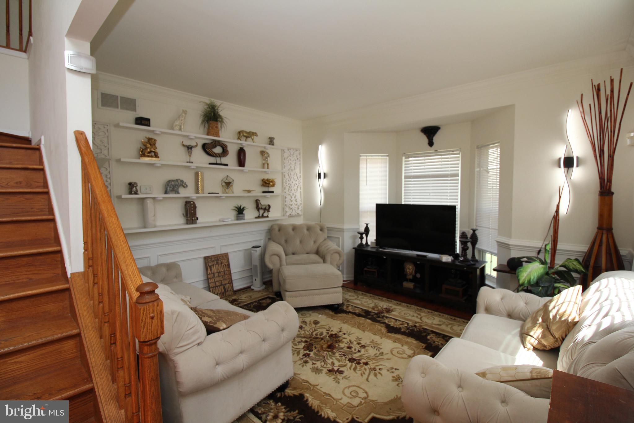 5 Kelly Drive Sicklerville, NJ 08081 - Photo 7 of 32 a living room with furniture and a flat screen tv