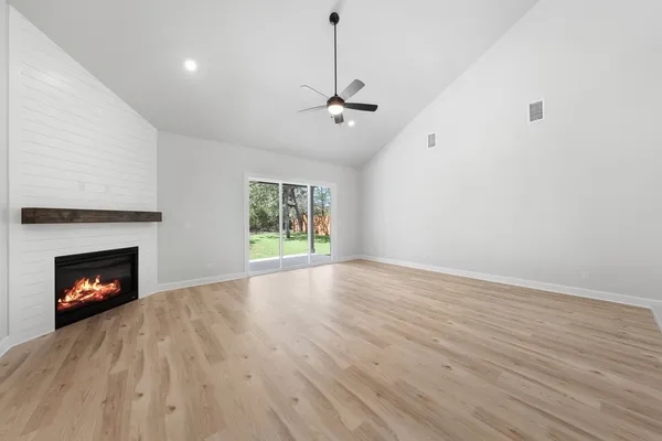 a room with gym equipment and a large window