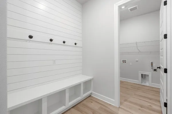 a white bath tub sitting in a bathroom