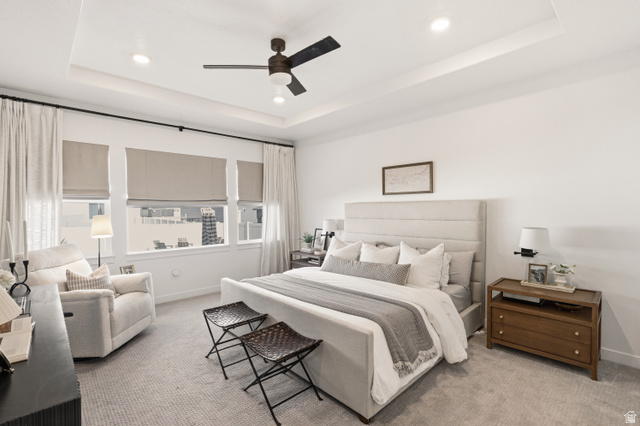 870 North Ada Loop Lehi, UT 84048 - Photo 19 of 51 Spacious room featuring a tray ceiling with recessed lighting and a ceiling fan