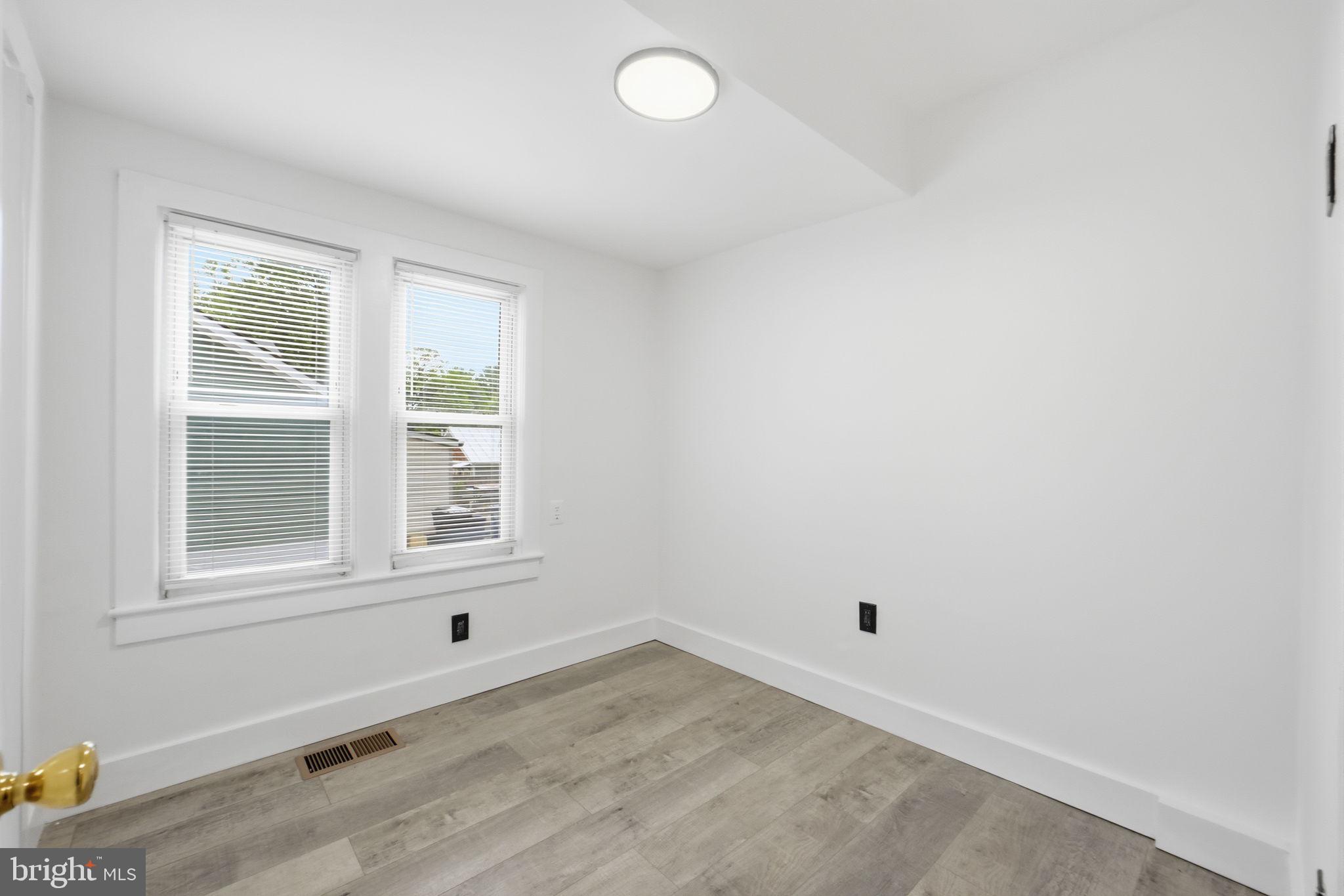 5906 Berwyn Road College Park, MD 20740 - Photo 27 of 46 an empty room with a window