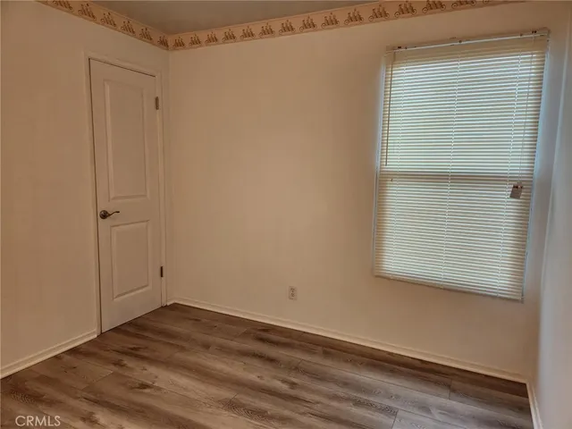 a view of a window in an empty room