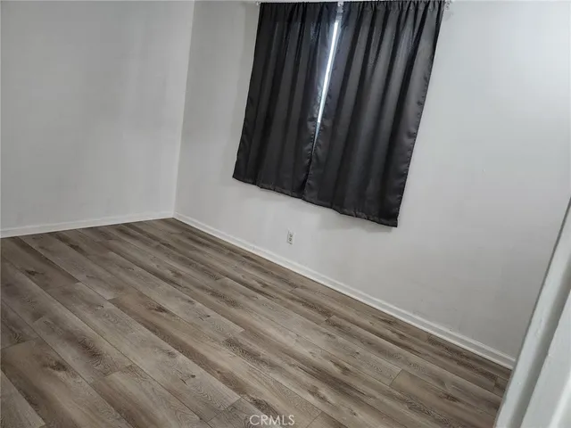 a bath room with a sink vanity tub and shower