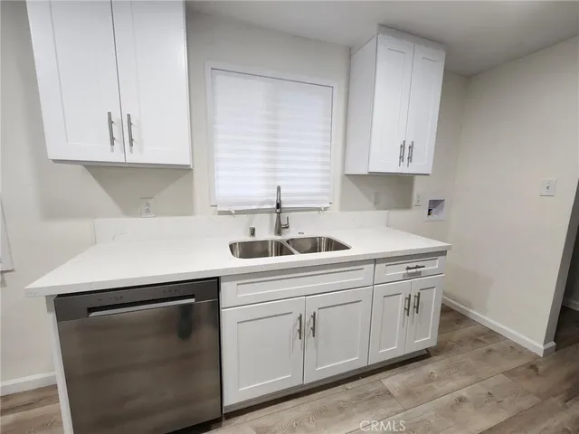 a view of an entryway with kitchen