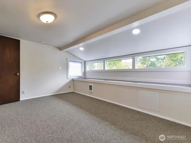 an empty room with a natural light