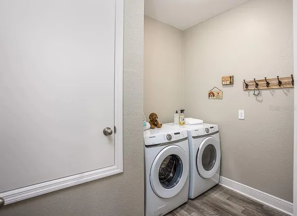 a utility room with dryer and washer