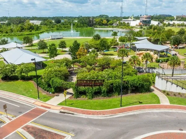 a view of a garden with a lake view