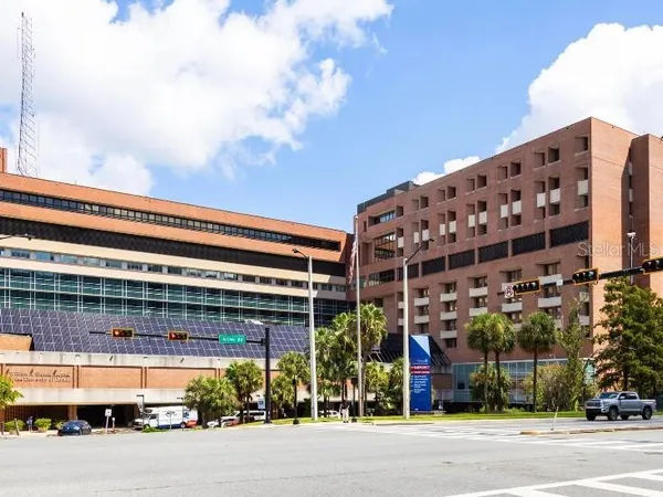 a view of a building with a street