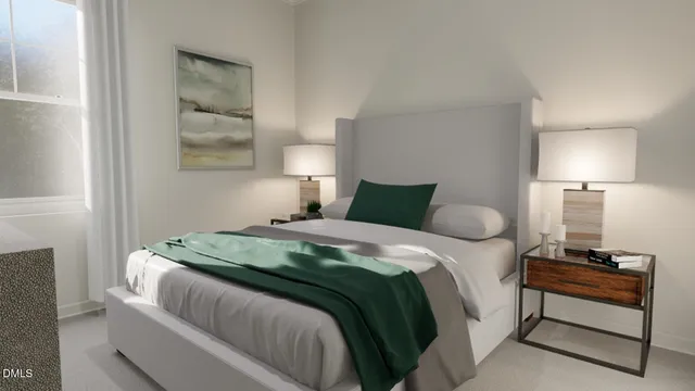 a bedroom with a bed and a lamp