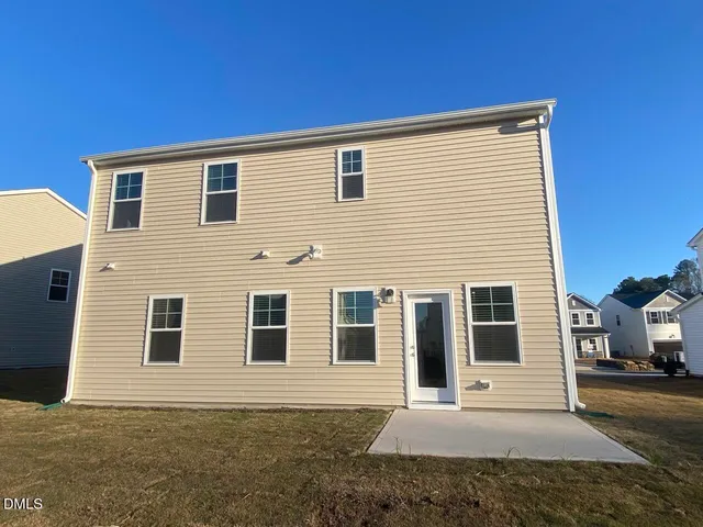 a view of a house with a patio
