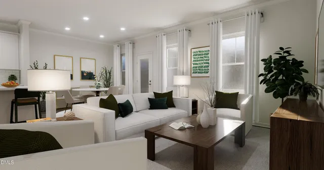 a living room with furniture potted plant and a window