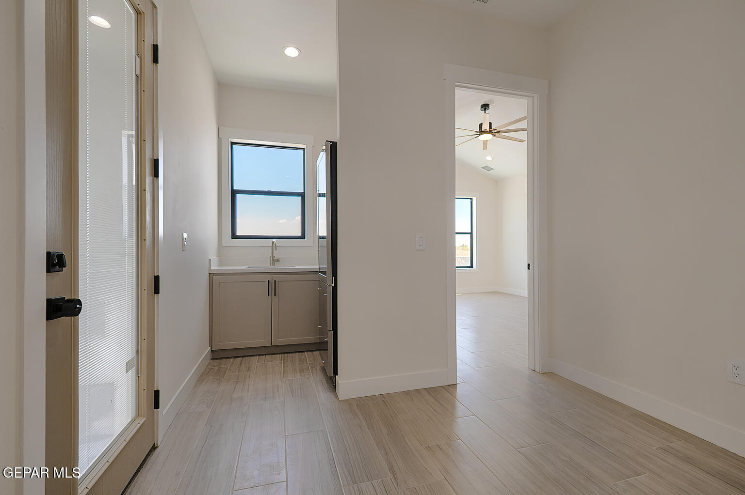 6035 Dusty Prints Road Las Cruces, NM 88007 - Photo 26 of 61 6025-Dusty-Prints-Wet-Bar-Back-Door