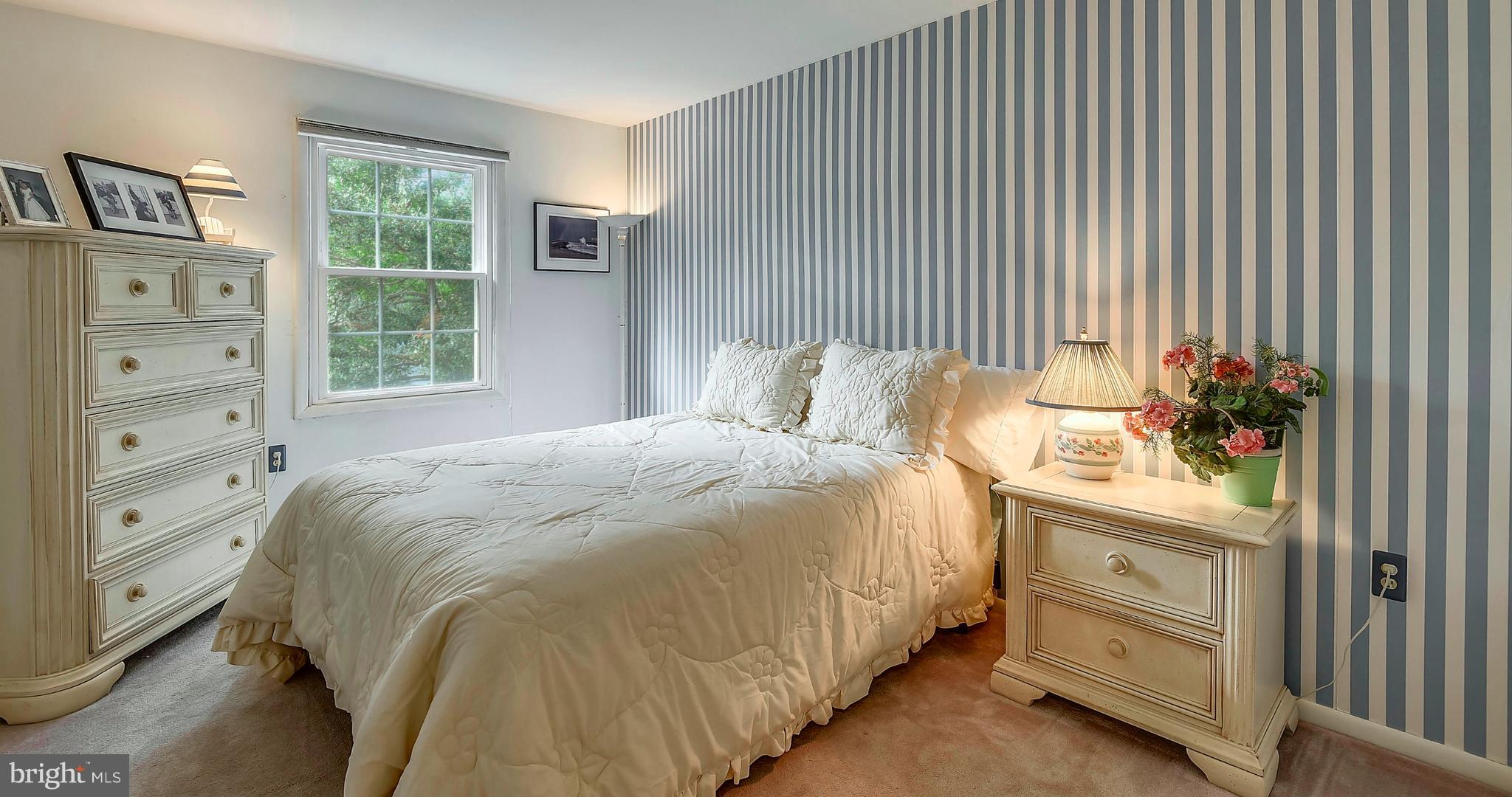 11003 Howland Drive Reston, VA 20191 - Photo 14 of 21 a bedroom with a bed and a window