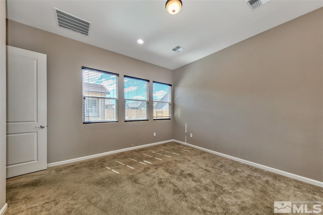 2109 Gregorgio Ln. Reno, NV 89521 - Photo 14 of 38 a view of an empty room with a window