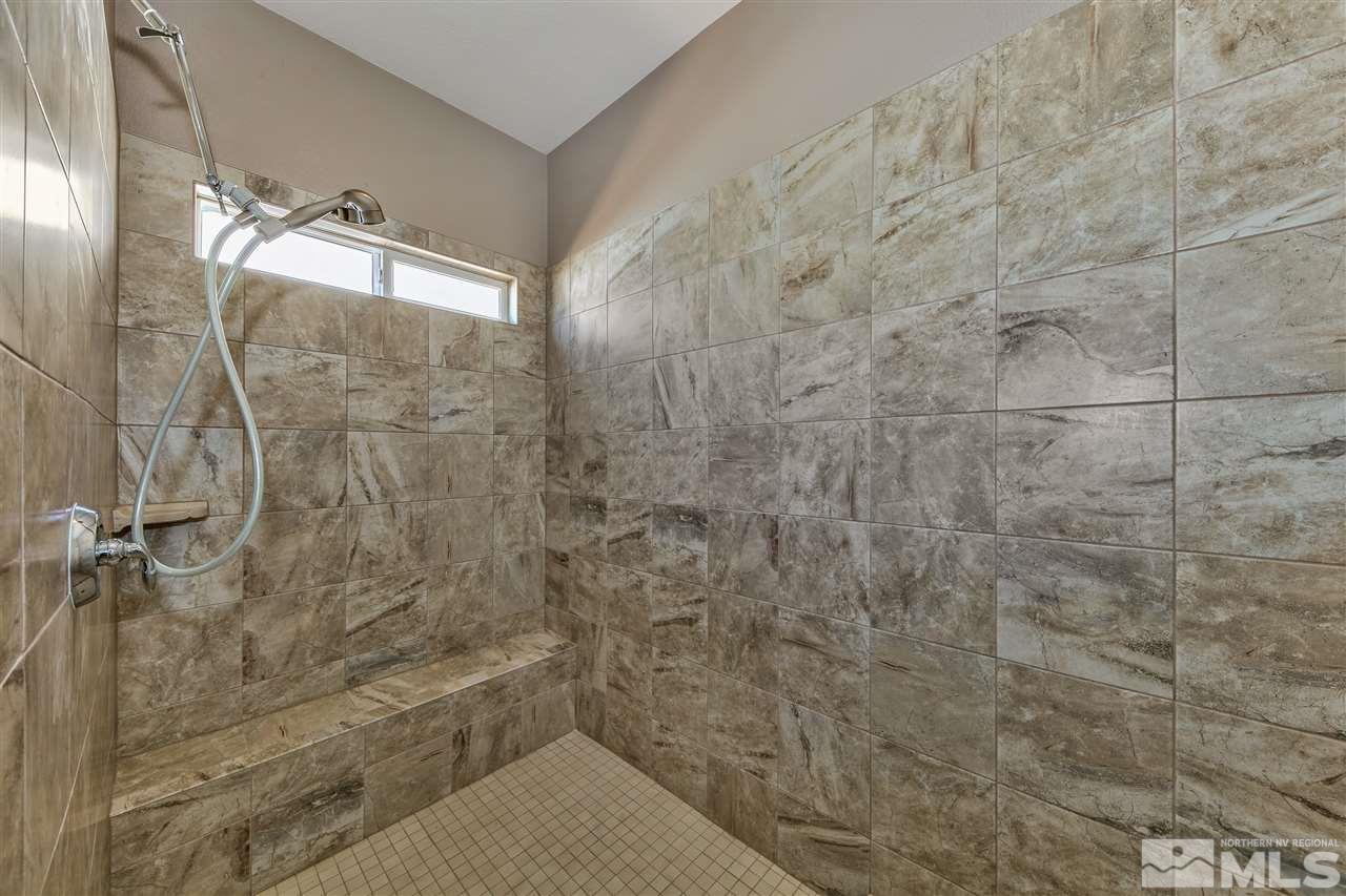 2109 Gregorgio Ln. Reno, NV 89521 - Photo 16 of 38 a bathroom with a shower