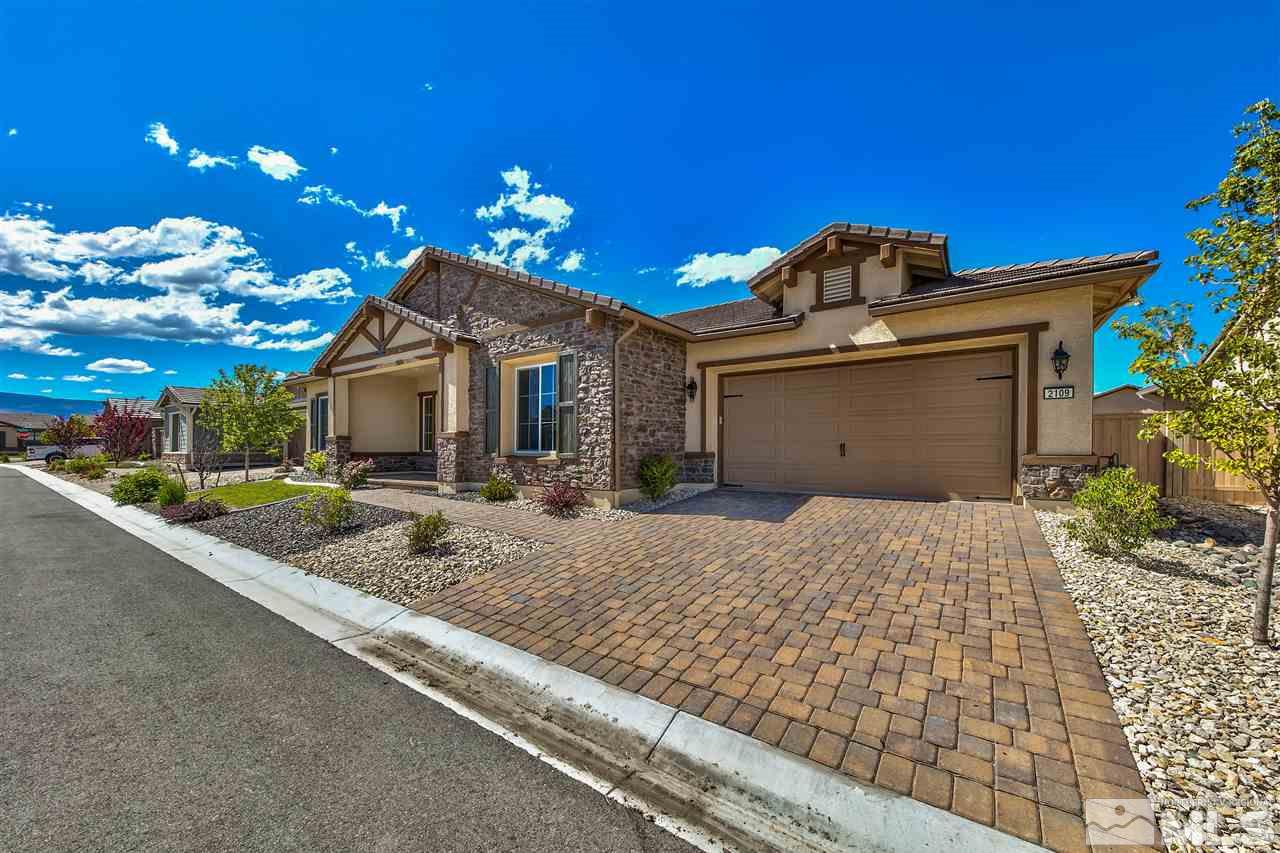 2109 Gregorgio Ln. Reno, NV 89521 - Photo 22 of 38 a front view of a house with a yard