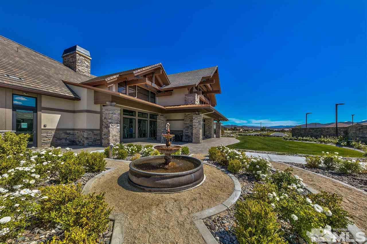 2109 Gregorgio Ln. Reno, NV 89521 - Photo 25 of 38 a front view of a house with sitting area and swimming pool