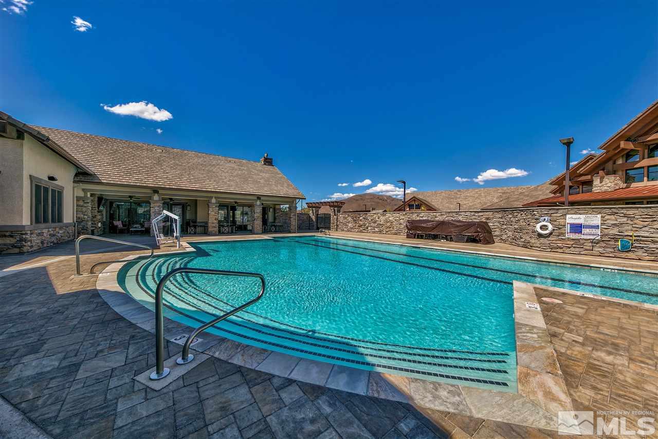 2109 Gregorgio Ln. Reno, NV 89521 - Photo 29 of 38 a view of a swimming pool with chairs