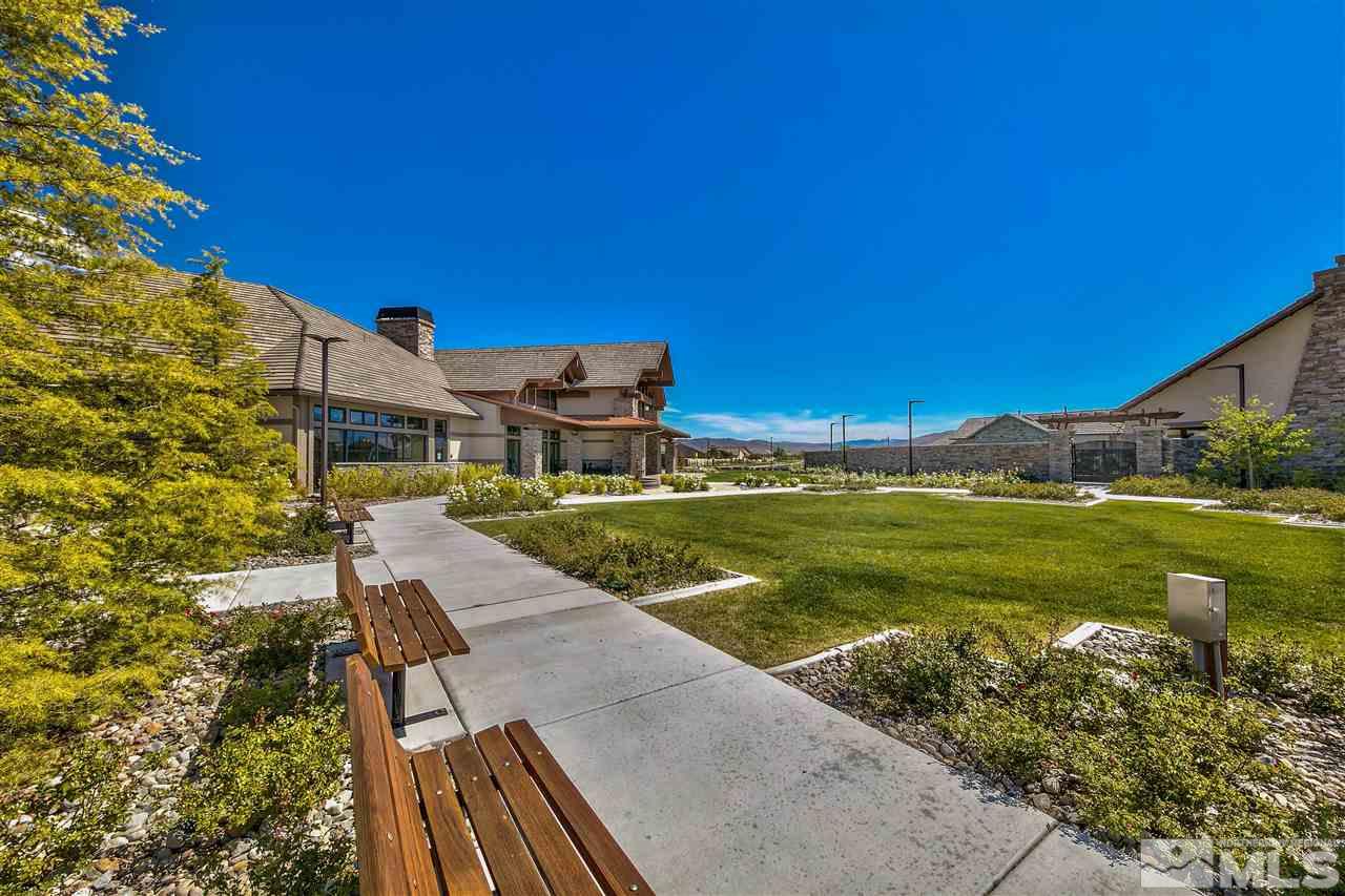 2109 Gregorgio Ln. Reno, NV 89521 - Photo 36 of 38 a view of a lake with a house in the background