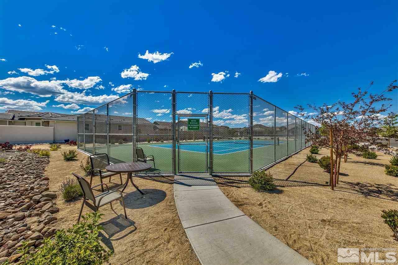 2109 Gregorgio Ln. Reno, NV 89521 - Photo 37 of 38 a view of a patio with a table and chairs