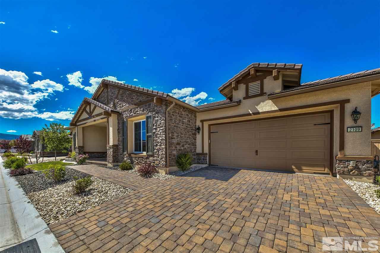 2109 Gregorgio Ln. Reno, NV 89521 - Photo 7 of 38 a view of a house with a patio