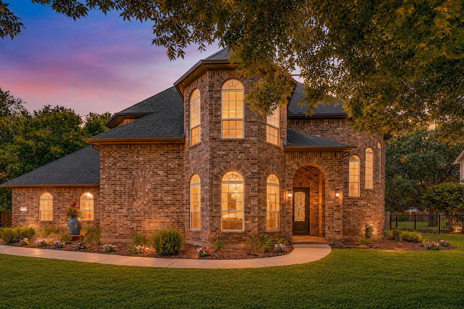 5327 Whitmore Fulshear, TX 77441 - Photo 50 of 50 Timeless architecture, mature landscaping, and an elegant presence combine to create exceptional curb appeal in this beautifully maintained custom home. Don't miss this rare opportunity to make Weston Lakes your home. Call today to schedule a private tour!